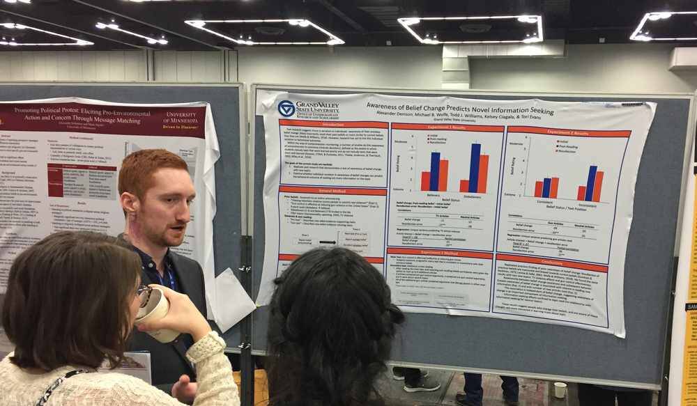 Psych major Alex Denison presenting a poster